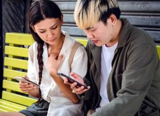 What Are the Best Technological Tools to Use for Student Engagement? Couple working on phone
