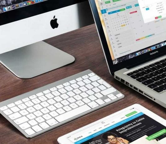 Modern IR website workstation showing iPad MacBook and Mac computer Modern IR website workstation showing iPad MacBook and Mac computer
